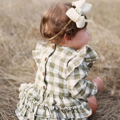 moss gingham bubble romper for babies with ruffles on butt and shoulders