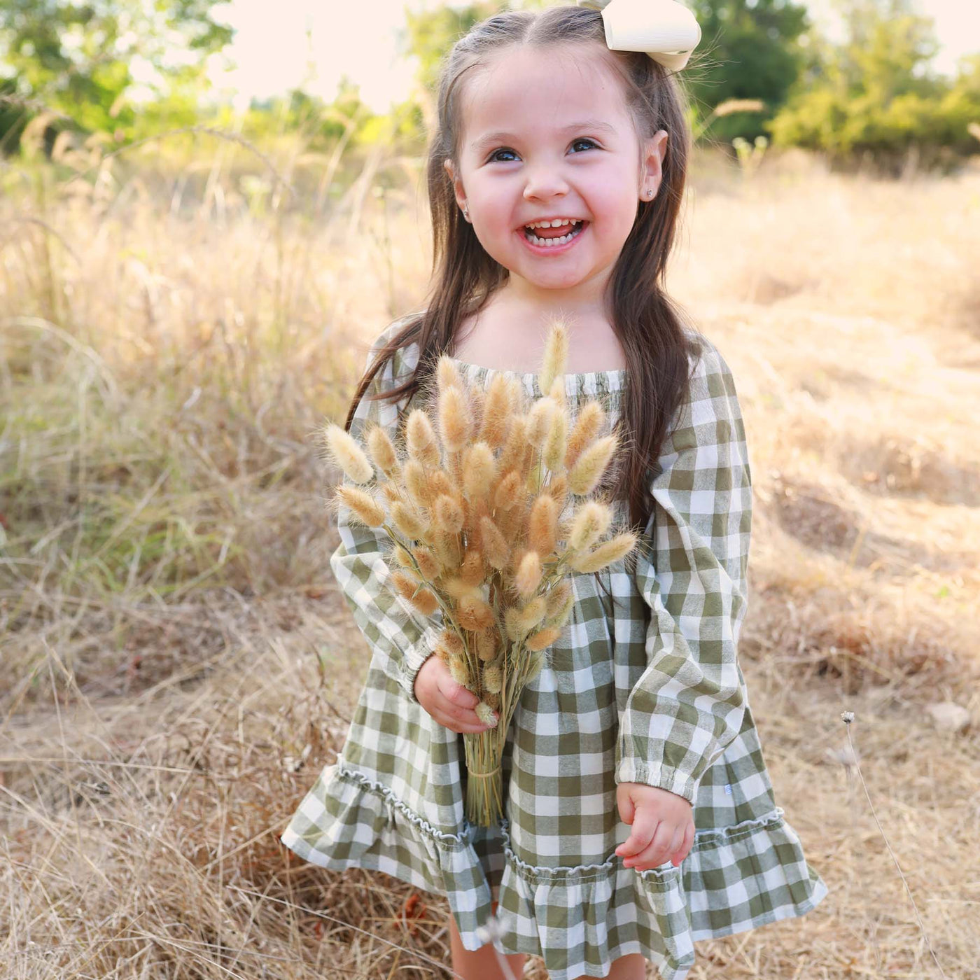 long sleeve smocked dress with green gingham print 