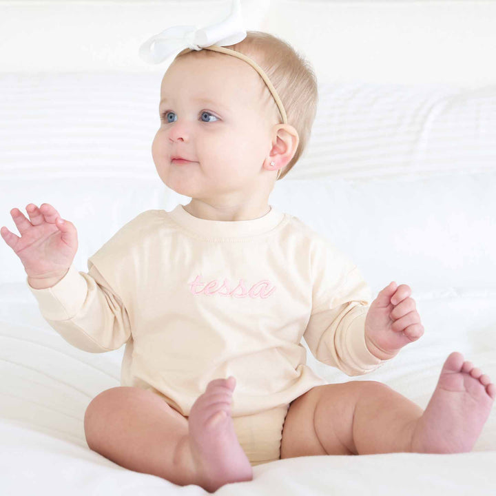 natural tan long sleeve embroidered name romper for baby girls light pink thread 