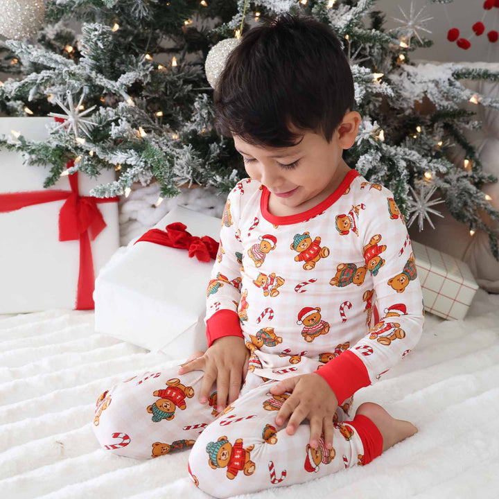 caden lane bamboo pajamas for kids with teddy bears wearing christmas sweaters sprinkled with candy canes 