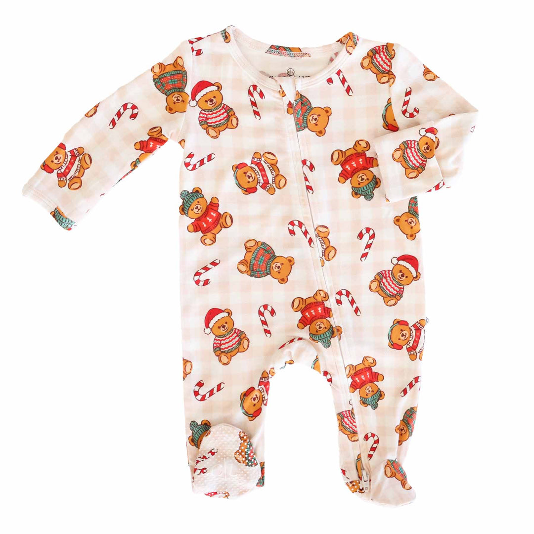neutral gingham christmas teddy bear footie with sweaters wearing beanies and santa hats with scattered candy canes 