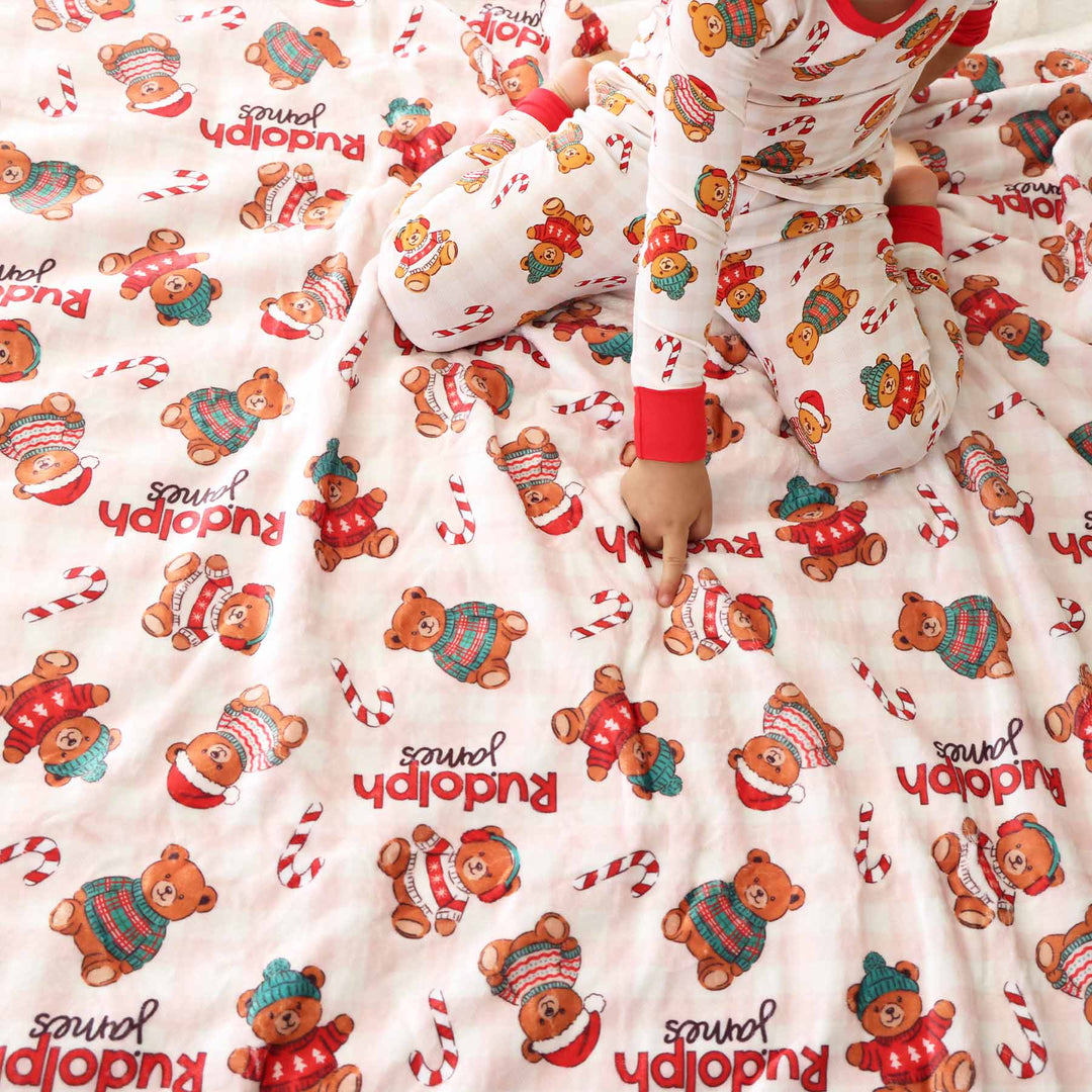 personalized blanket for kids with teddy bears wearing christmas sweaters and santa hats with candy canes 