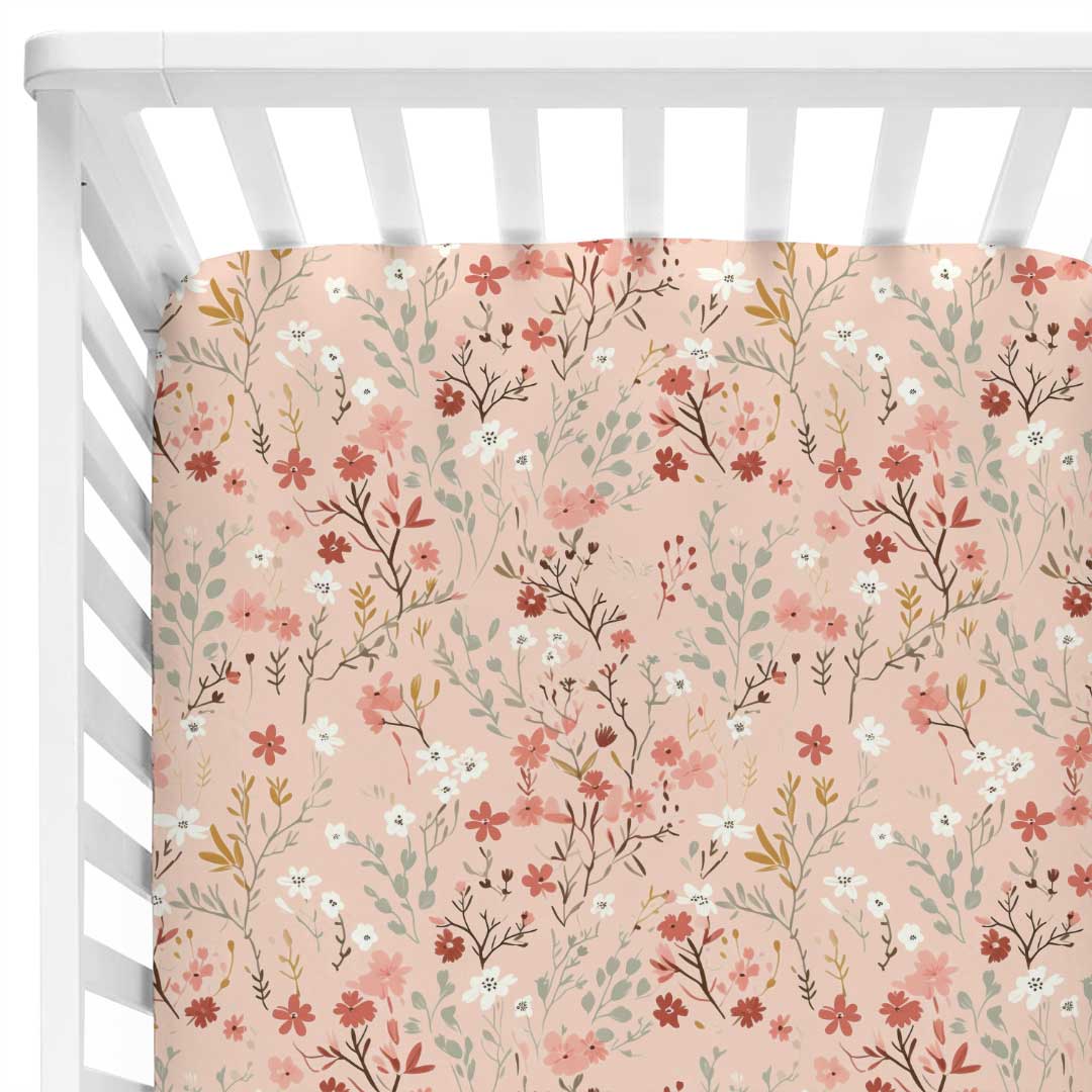 peach floral crib sheet for nursery