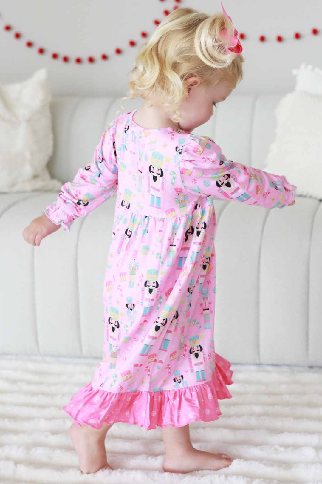 Little girl in Caden Lane nutcracker pink dress