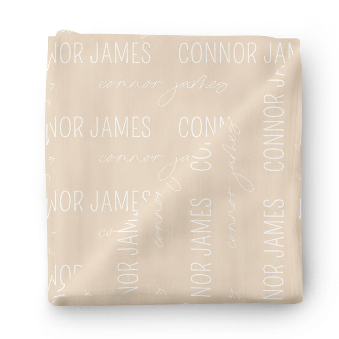 personalized oatmeal baby name swaddle blanket block and script