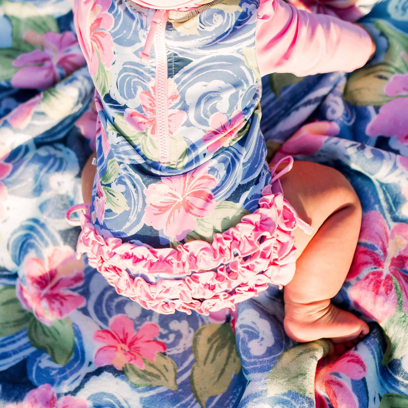 ohana ruffle bottom swimsuit for babies blue and pink