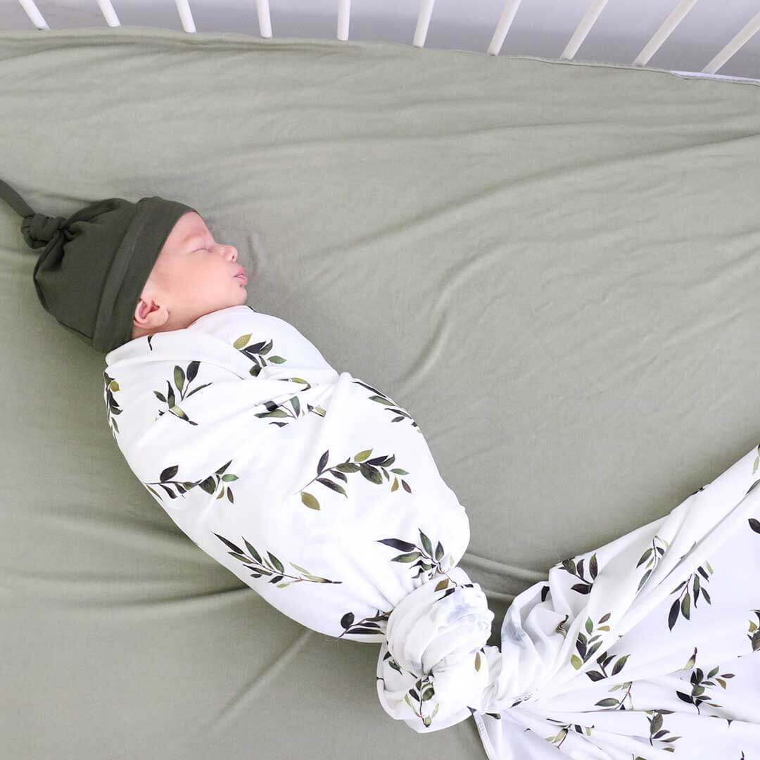 newborn oversized swaddle blanket with olive leaves