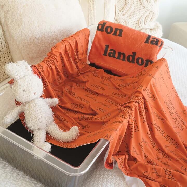 oklahoma state orange personalized swaddle blanket 