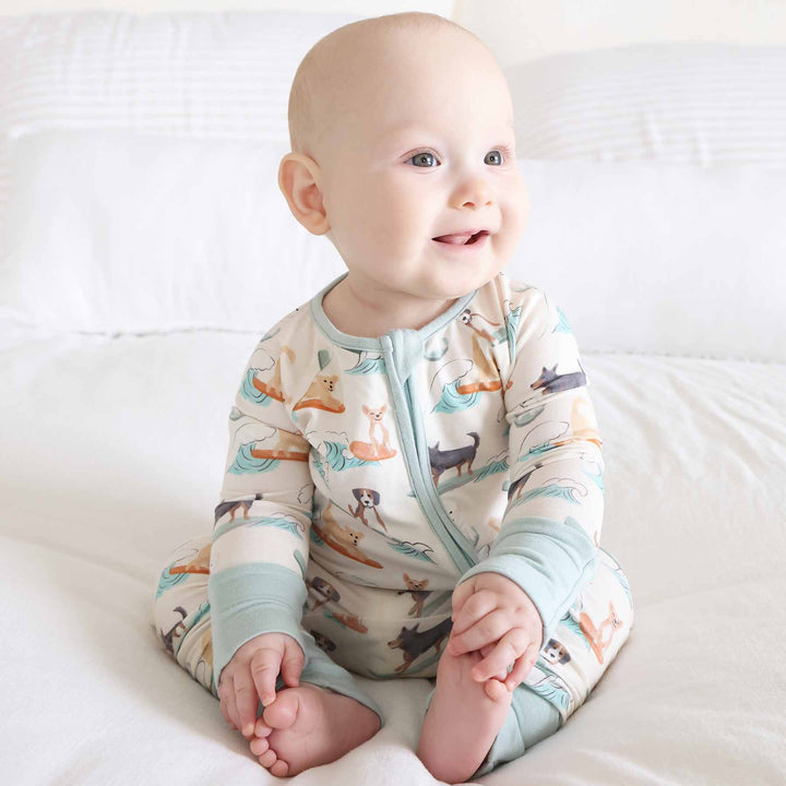 tan, turquoise and orange surfing dog convertible zip romper for babies and toddlers 