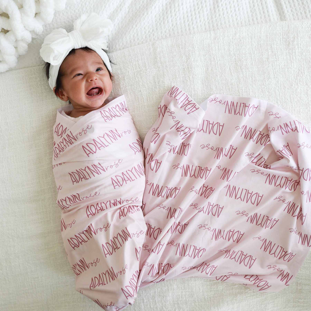 pink baby name swaddle blanket 