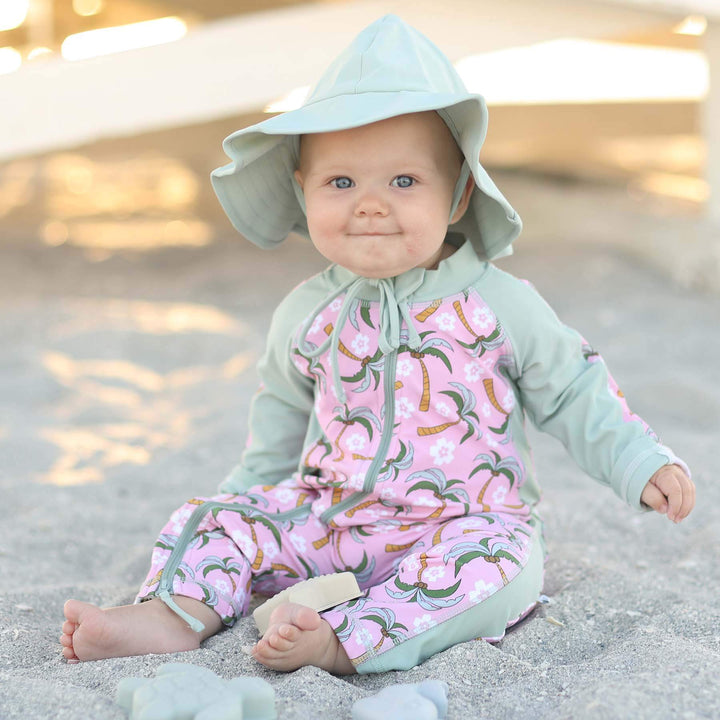 pink and green palm tree swim romper full length for babies with zipper 
