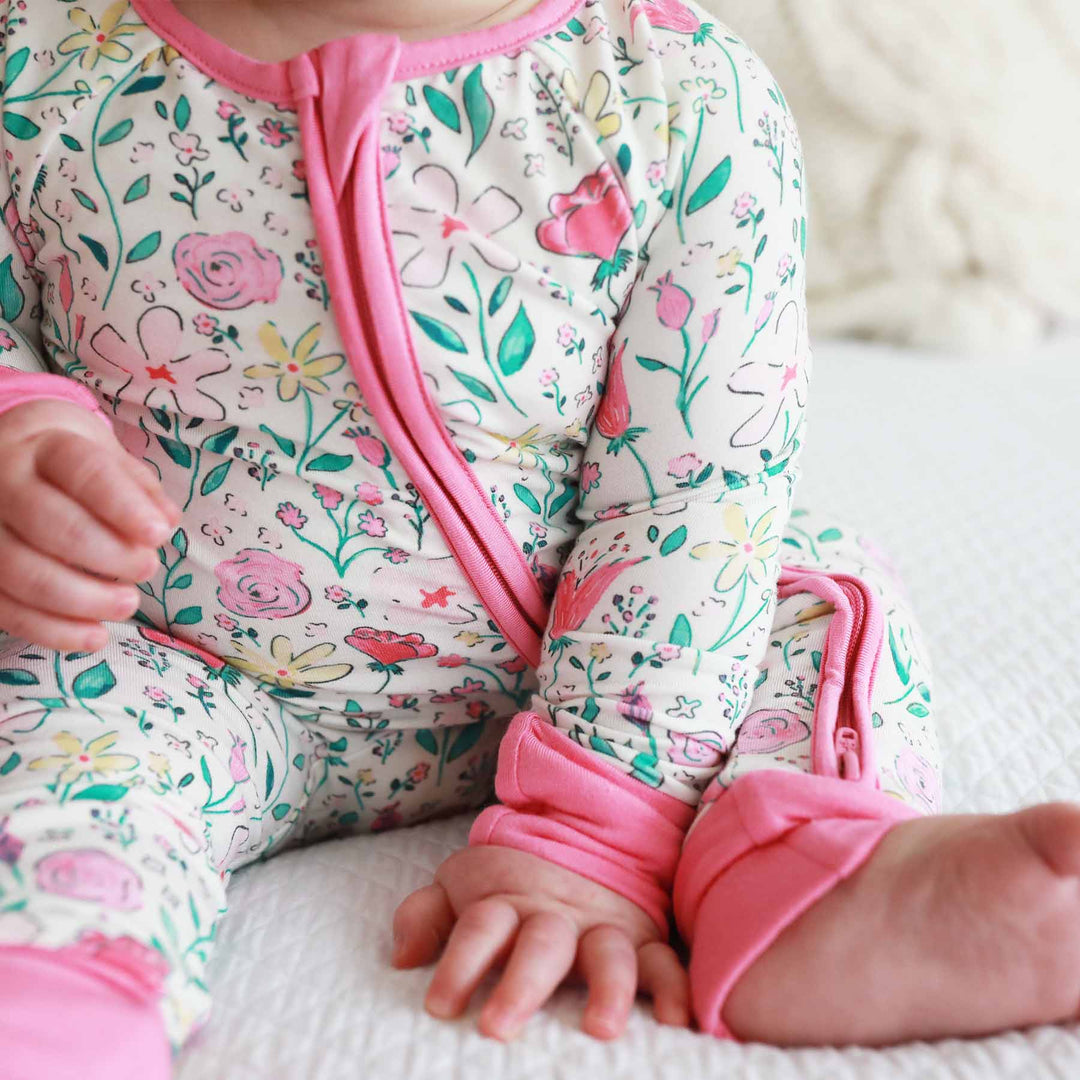 pastel floral zip romper for babies