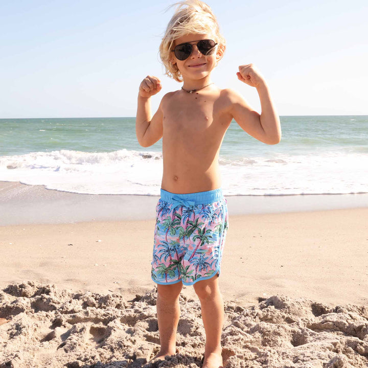 blue, pink and green swim trunks for boys with palm trees