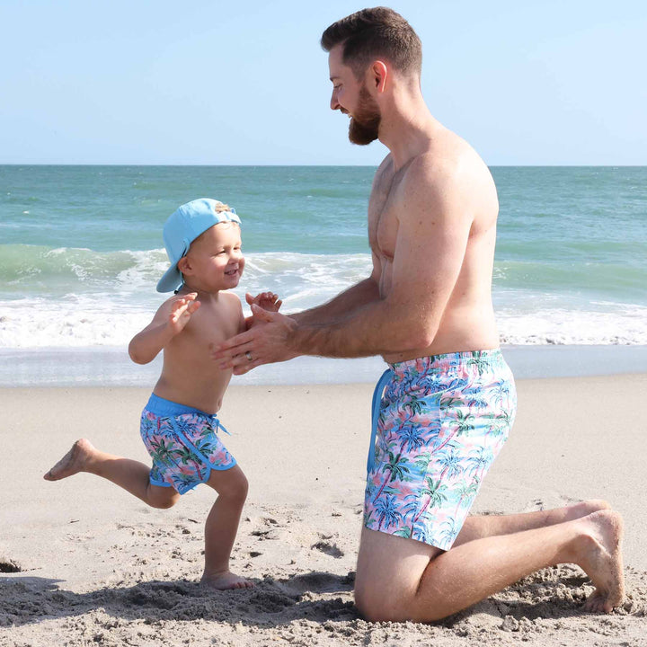 men's swim trunks with palm trees