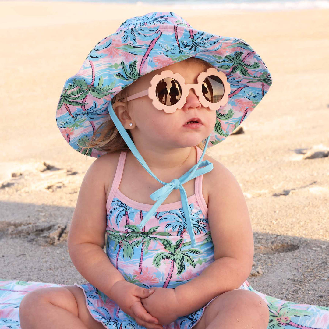 baby beach hat palm trees