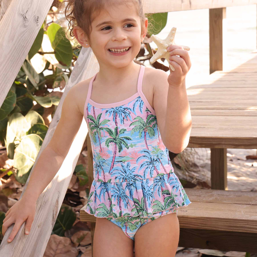 girl's tankini swimsuit with palm trees