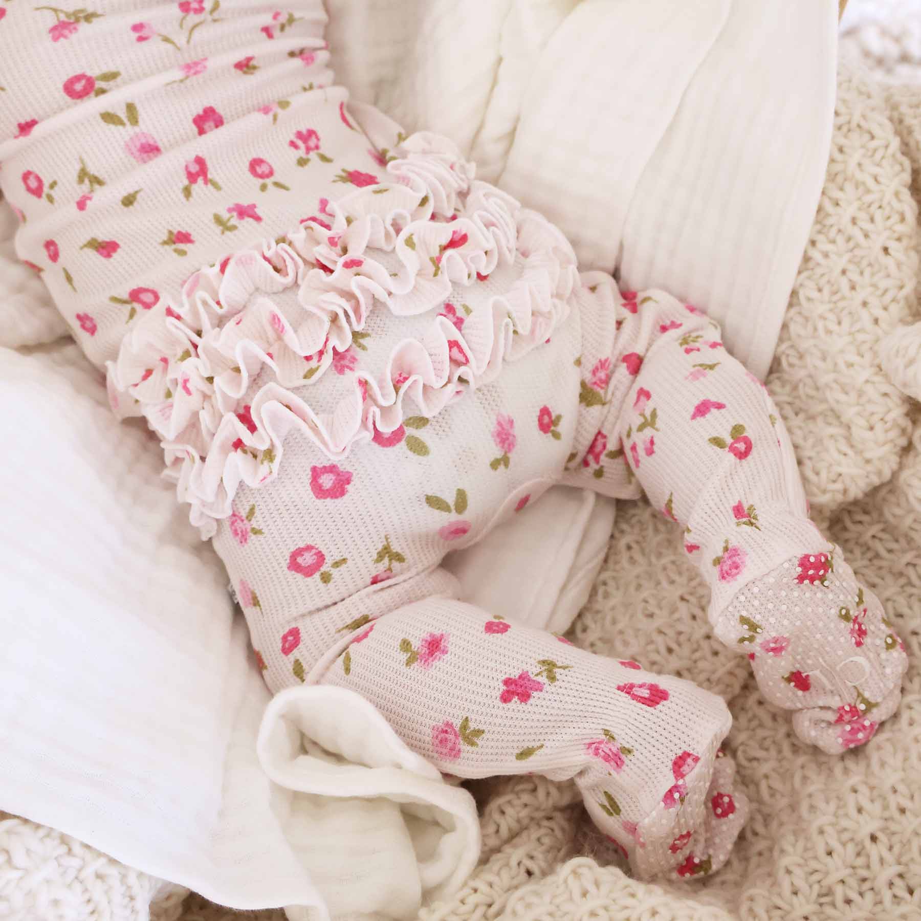 pink floral ruffle bottom zipper footie for baby girls bamboo waffle