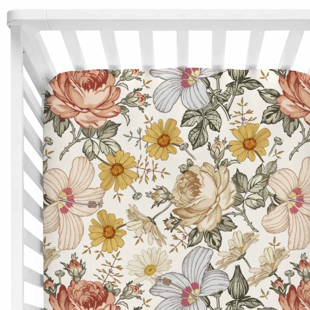rust and yellow floral crib sheet 