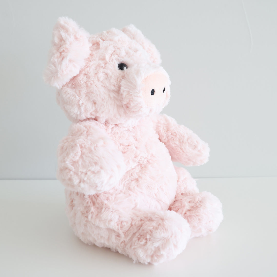 fluffy light pink pig stuffed animal