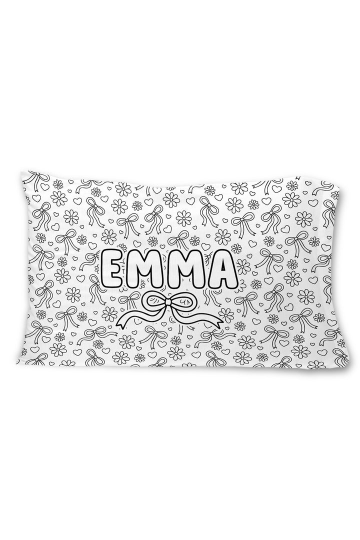 Caden Lane colorable pillowcase with the name "Emma" and a bow illustration, surrounded by an allover pattern of flowers, bows, and hearts.