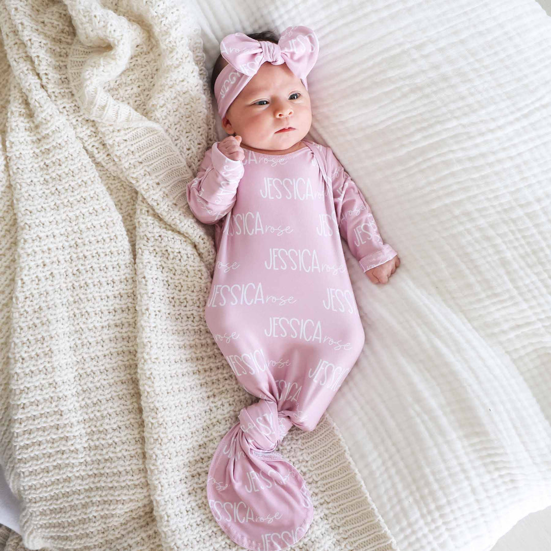 pink font duo knot gown for babies 