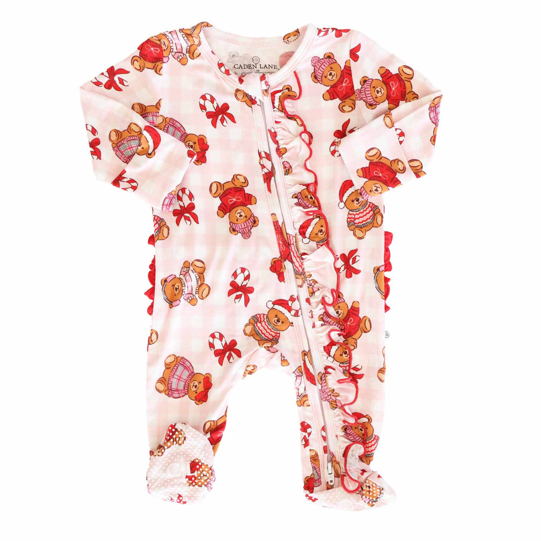 ruffle zipper footie for girls with teddy bears dressed in christmas sweaters in santa hats, ear muffs, beanies and bows sprinkled with candy canes