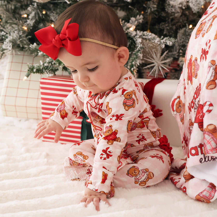 ruffle footie with teddy bears dressed in christmas sweaters and candy canes 