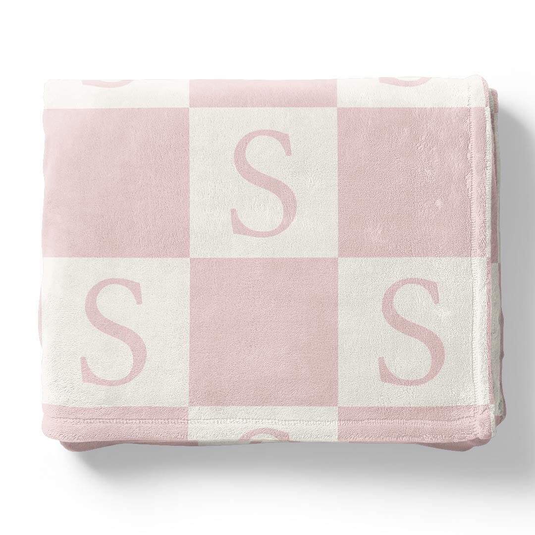checkered print initial blanket pink