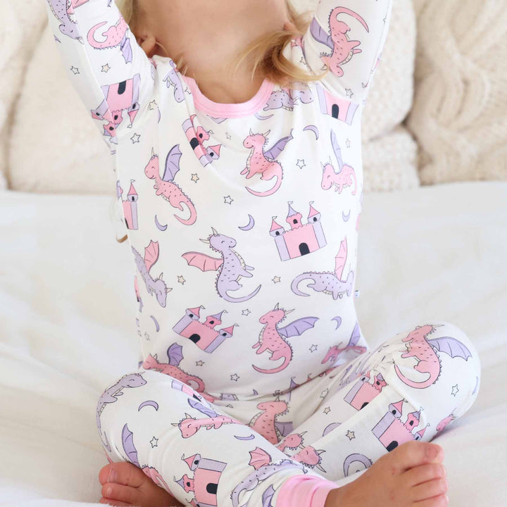 pink and purple dragon and castle two piece pajama set for girls 