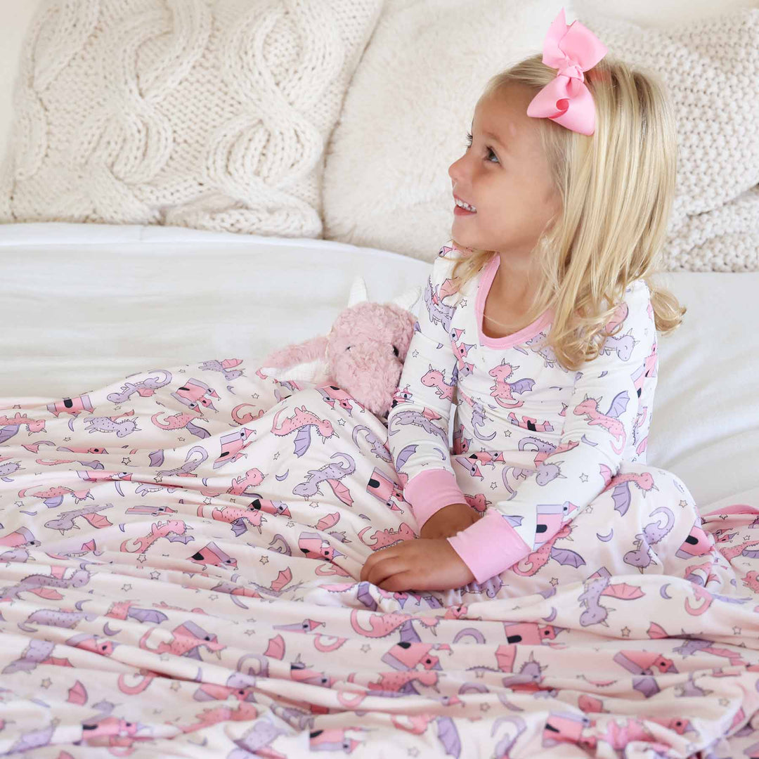 dragon adventure pink two piece pajama set for kids with matching bamboo blanket 