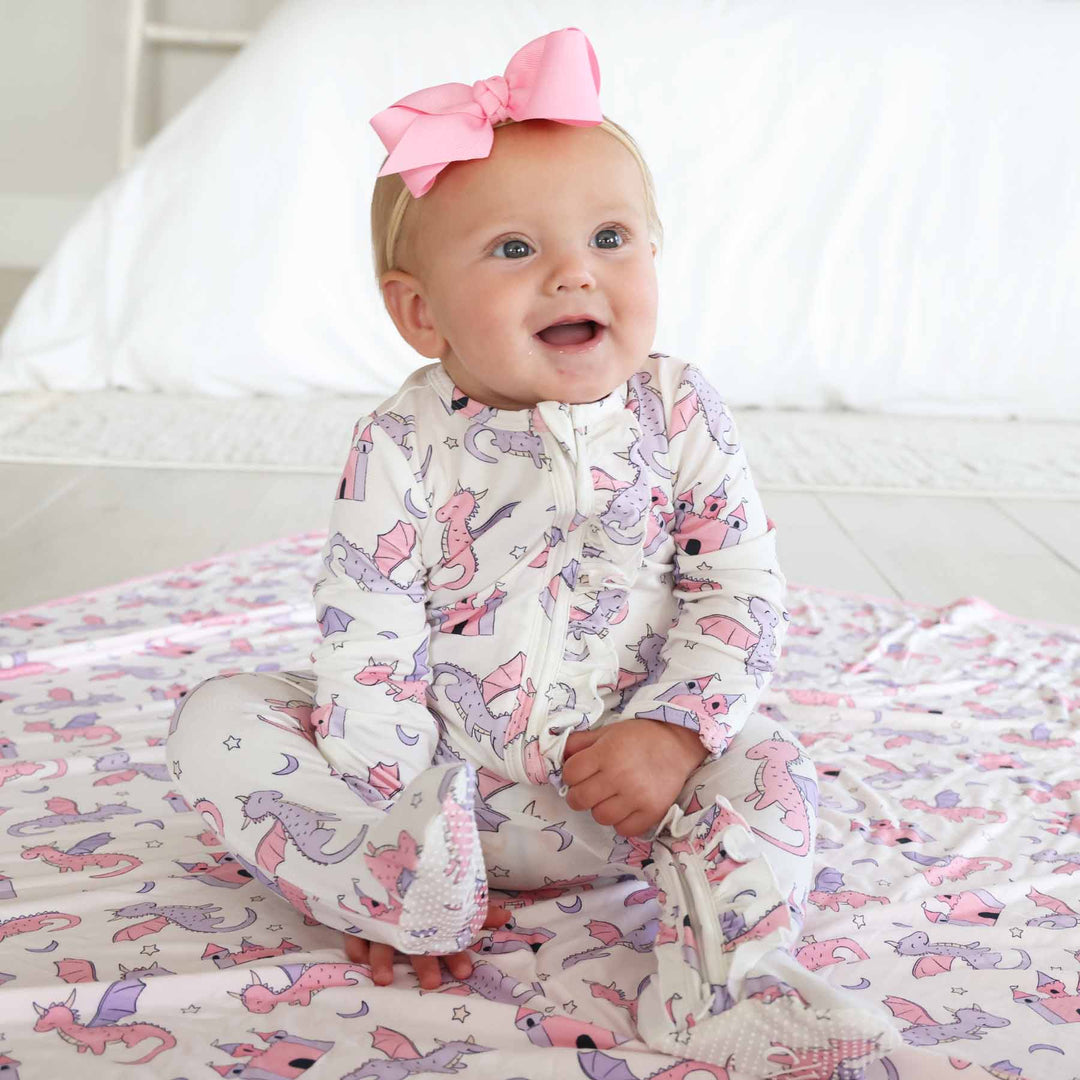pink dragon adventure long sleeve zipper footie for baby girls 