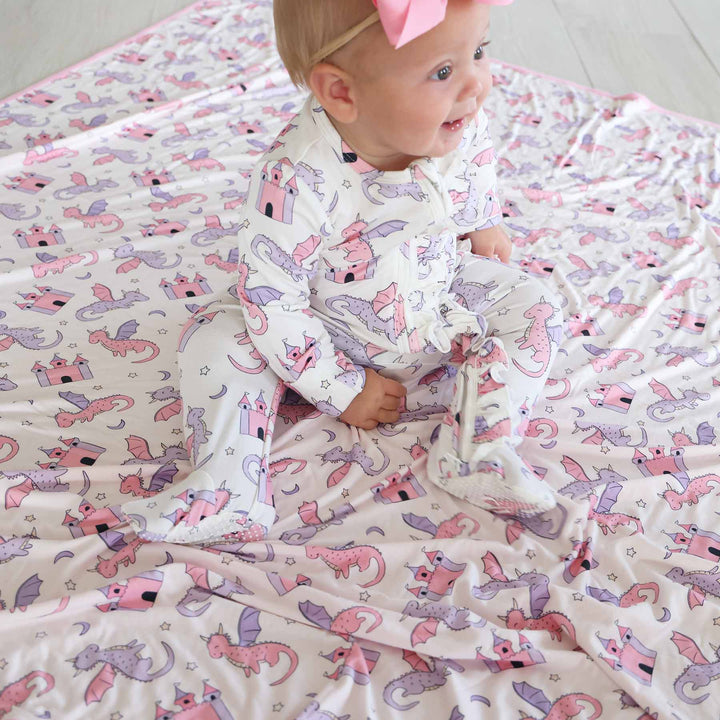 pink dragon adventure long sleeve ruffle bottom zipper footie for girls 