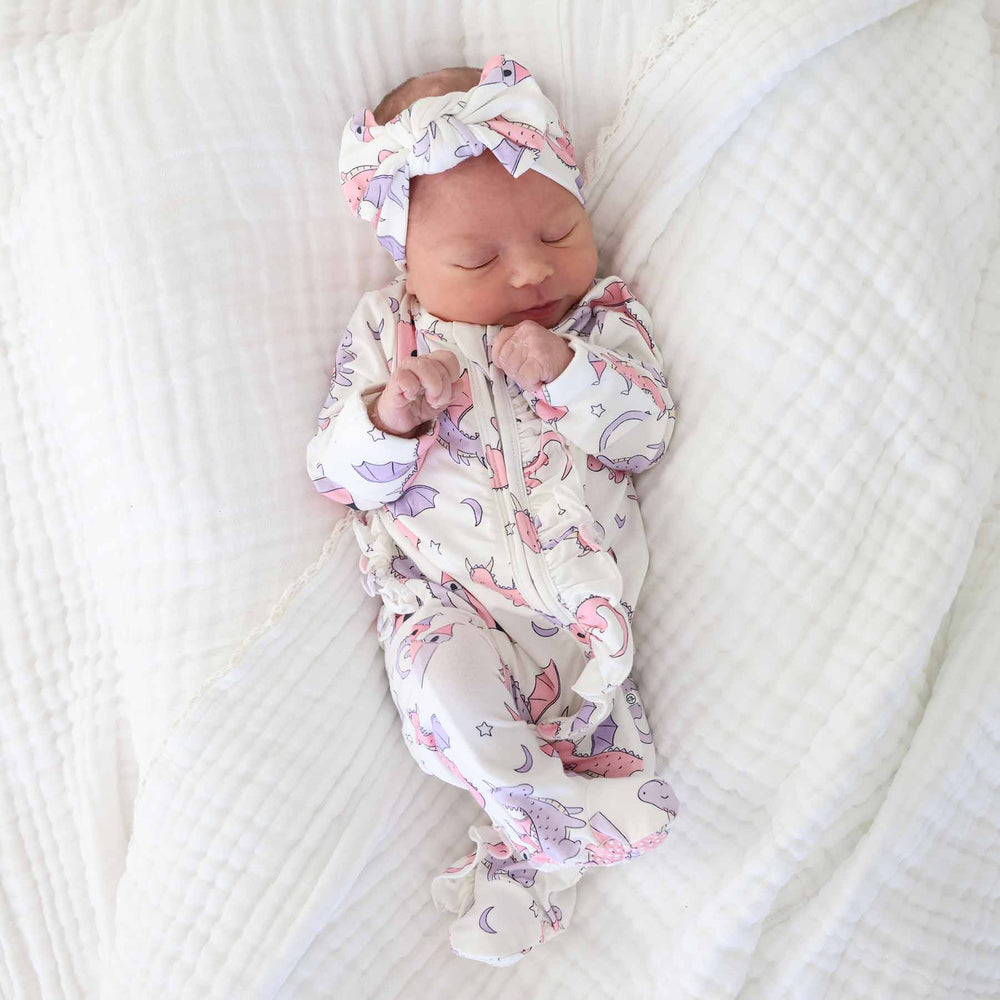 pink dragon and castle ruffle zipper footie for girls 