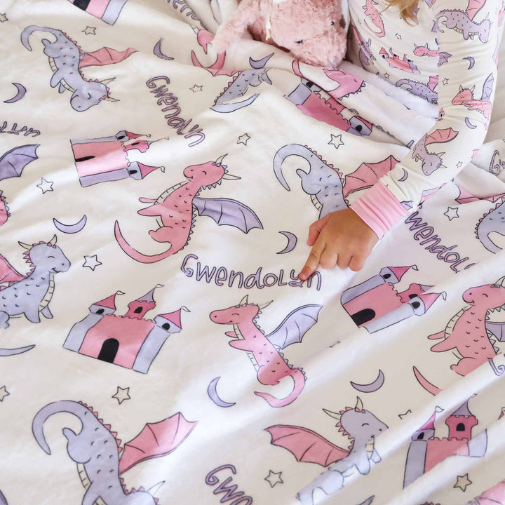 smiling dragon and castle personalized blanket for girls 