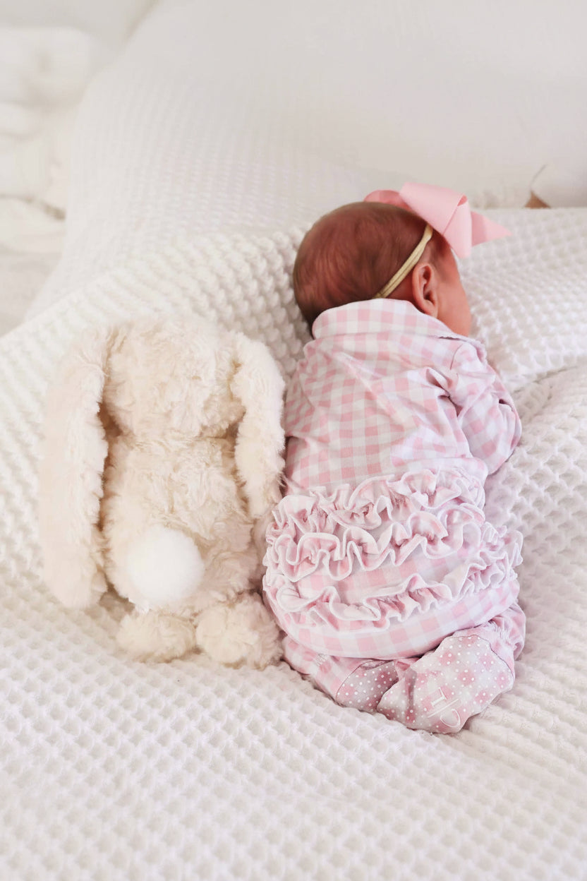 pink gingham print footie pajamas with ruffles for girls