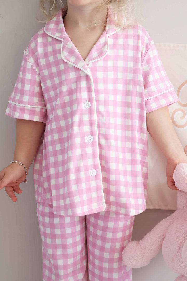 closeup of pink gingham short sleeve lounge set for girls 