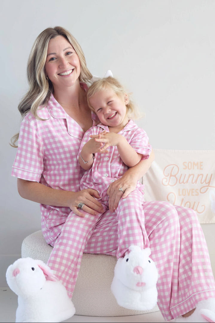 mom and daughter wearing matching pink gingham easter lounge sets 