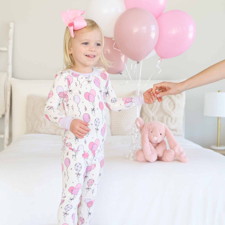 two piece pajama set for girls with pink balloons 