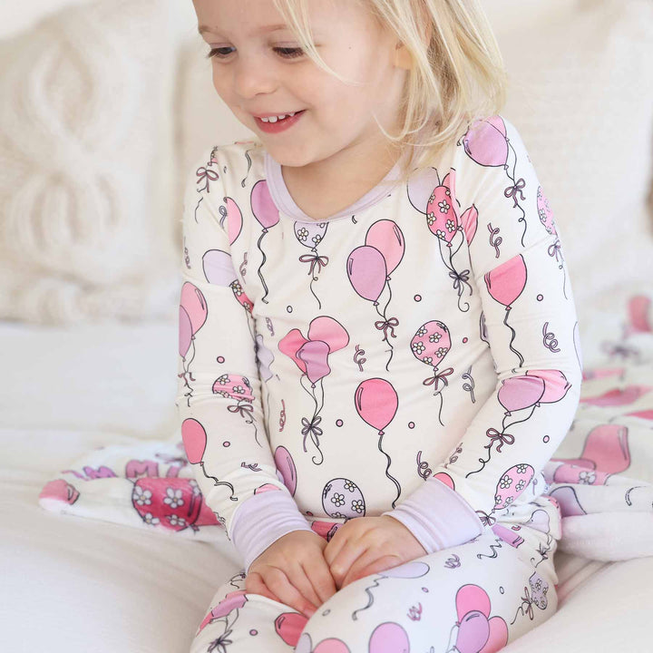 girls two piece pajama set with pink balloons and streamers