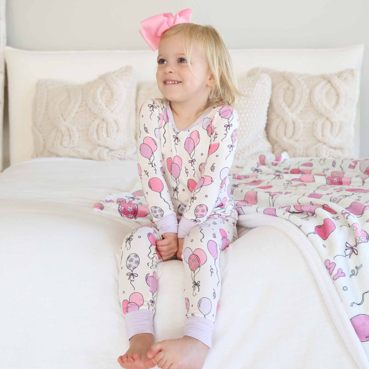 girls two piece pajama set with pink and purple balloons 