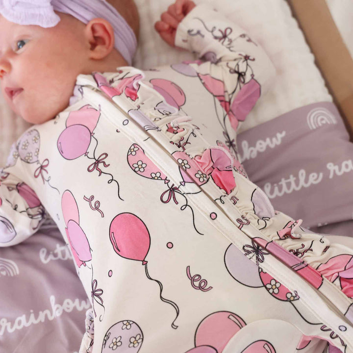 pink party time bamboo viscose ruffle zipper footie for baby girls 