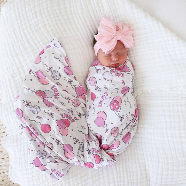 pink and purple balloon swaddle personalized with name for girls 