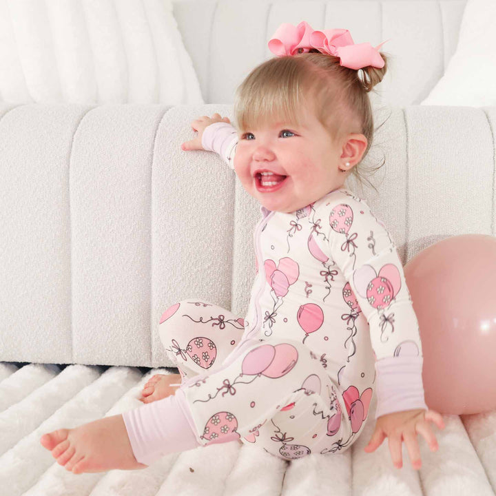 pink convertible zip romper pajama for baby and toddler girls