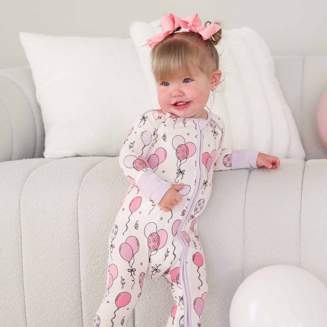 pink baby zip romper pajama with balloons 