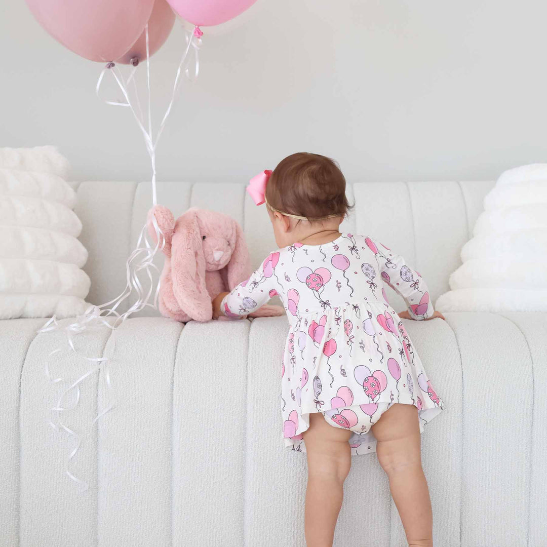 birthday party outfit for toddlers with balloons and streamers