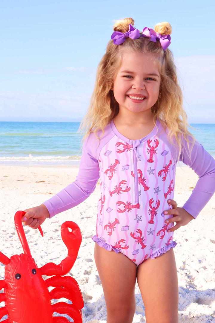 pink pinch me long sleeve rash guard swimsuit 