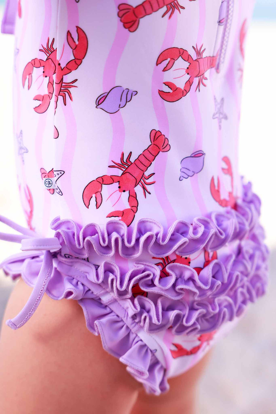 pinch me pink long sleeve rash guard with ruffle bottom with lobsters, seashells and starfish 