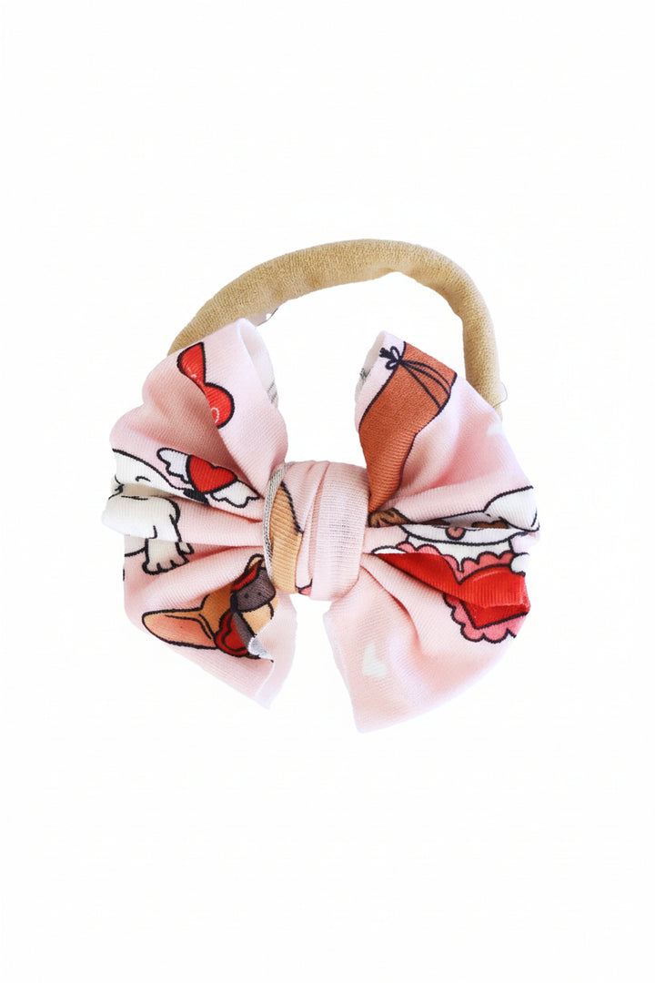 pink pups & kisses knit bow headband for babies 