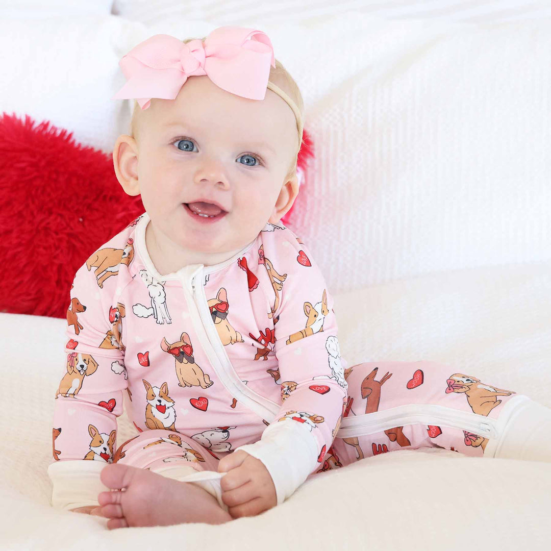 pink pups and kisses convertible zip romper for babies and toddlers 