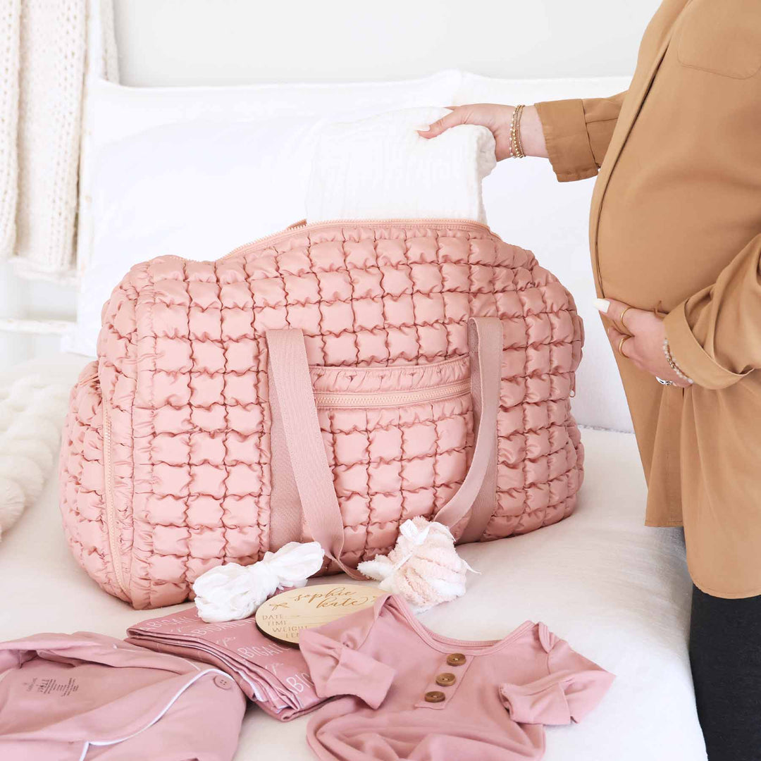 pink quilted duffel bag for women